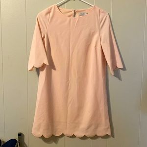 Baby pink mini dress with scallop detail